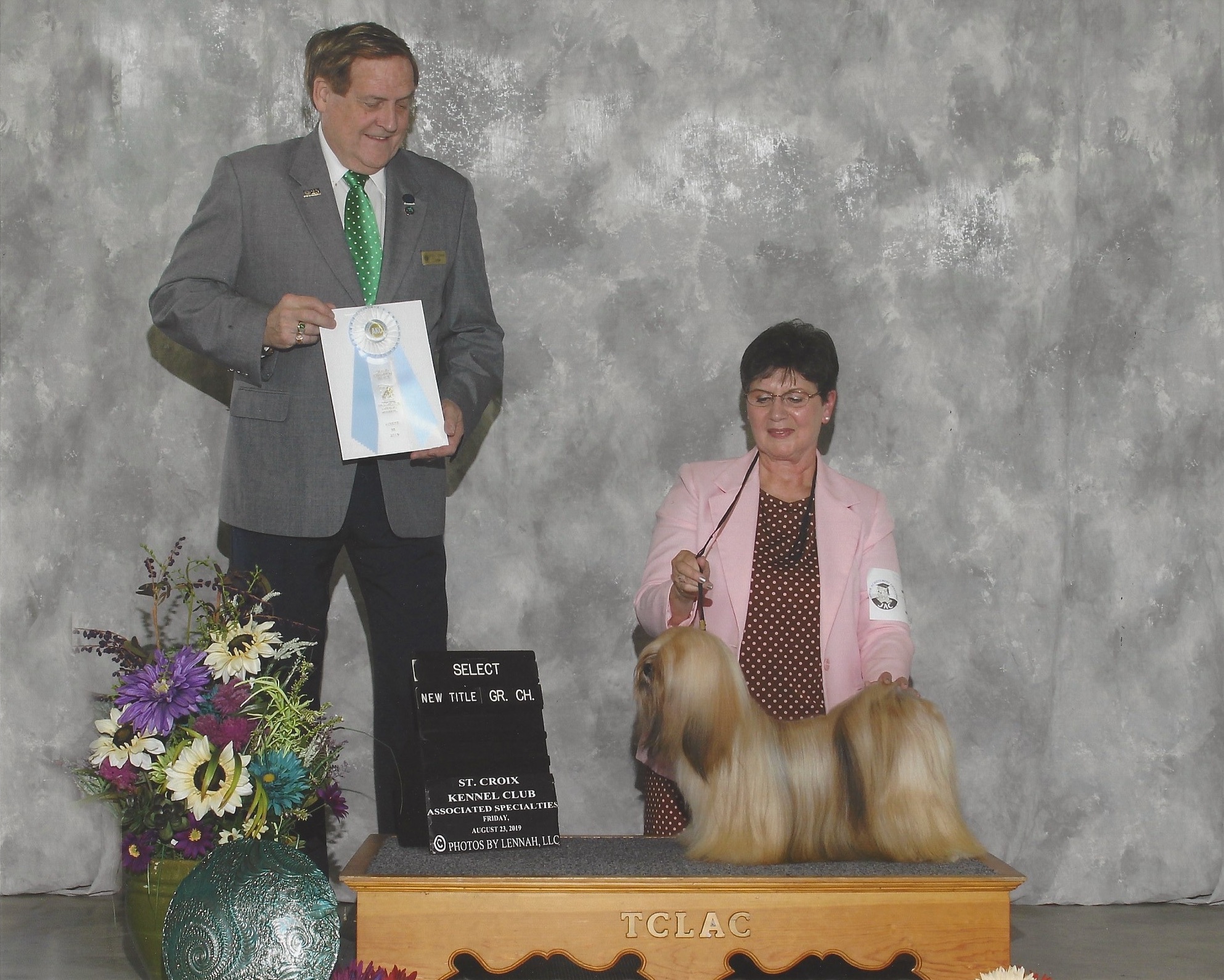 Lhasa Apso on winners podium